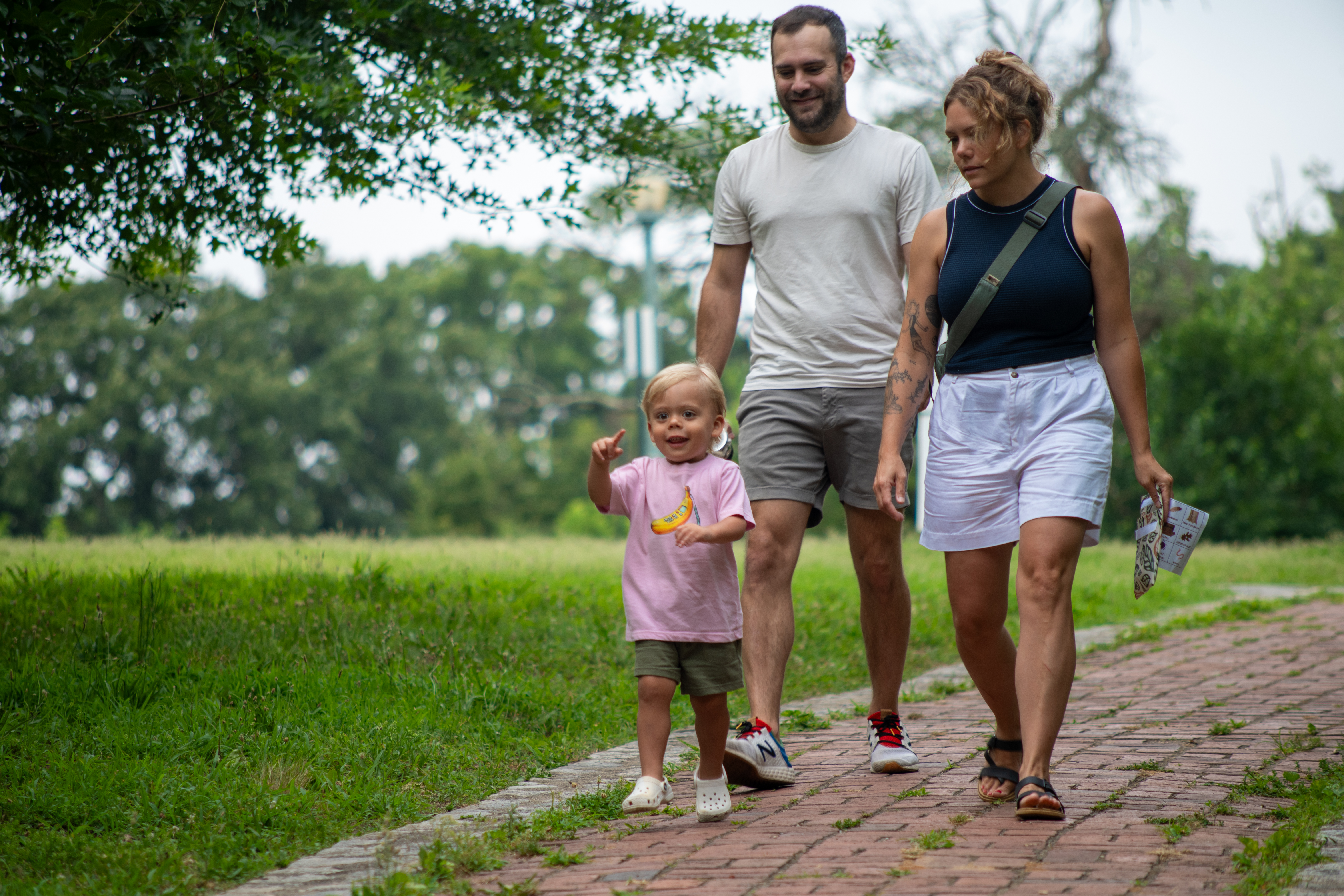 Theo Family - walking down brick path